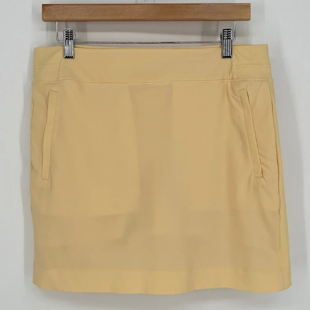 Athleta Women Brooklyn Athletic Skort Size‎ 10 Pale Yellow Golf Tennis Pockets